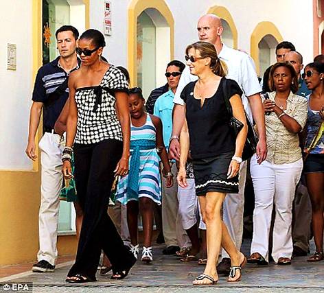 Michelle Obama - Spain vacation distribution of wealth